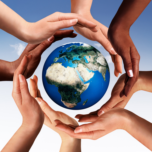 Conceptual peace and cultural diversity symbol of multiracial hands making a circle together around the world the Earth globe on blue sky background. Elements of this image furnished by NASA.