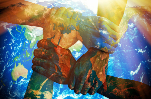 Together strong - Holding hands with earth texture
